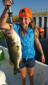 Daughter with 6 lb bass.